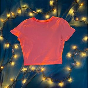 light/pastel pink crop top